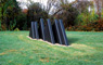 Untitled, view 3, ©1977<br>Precast concrete with integral color. <br>
54h x 48w x 216d (inches) <br>
Photo by unknown <br>
Private commission, Gladwyne, Pennsylvania