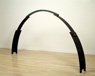 Natural Arch, ©1984<br>Steel and copper. <br>
79h x 148w x 12d (inches) <br>
Private collection <br>
Photo by Greg Benson <br>
Exhibited: Hazlett Memorial Award Exhibitions, 1985, Lawrence Oliver Gallery, 1987
