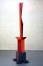 Powell&apos;s Knee (view 2), ©1984<br>Aluminum, automotive paint and mild steel. <br>
80h x 18.5w x 19d (inches) <br>
Private collection <br>
Exhibited: Marian Locks Gallery, 1984