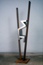 Sliprock (installation, view 2), ©1988<br>Nickel plated steel and weathering steel. <br>
61h x 12w x 12d (inches) <br>
Corporate collection <br>
Photo by Greg Benson <br>
Exhibited: Lawrence Oliver Gallery, 1987