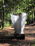 Dirty Devil (outdoors, view 2), ©1988<br>Aluminum. <br>
57h x 44w x 47d (inches) <br>
Estate of Charles Fahlen <br>
Photo by Herbert George <br>
Exhibited: Lawrence Oliver Gallery, 1989, Institute of Contemporary Art, 1991