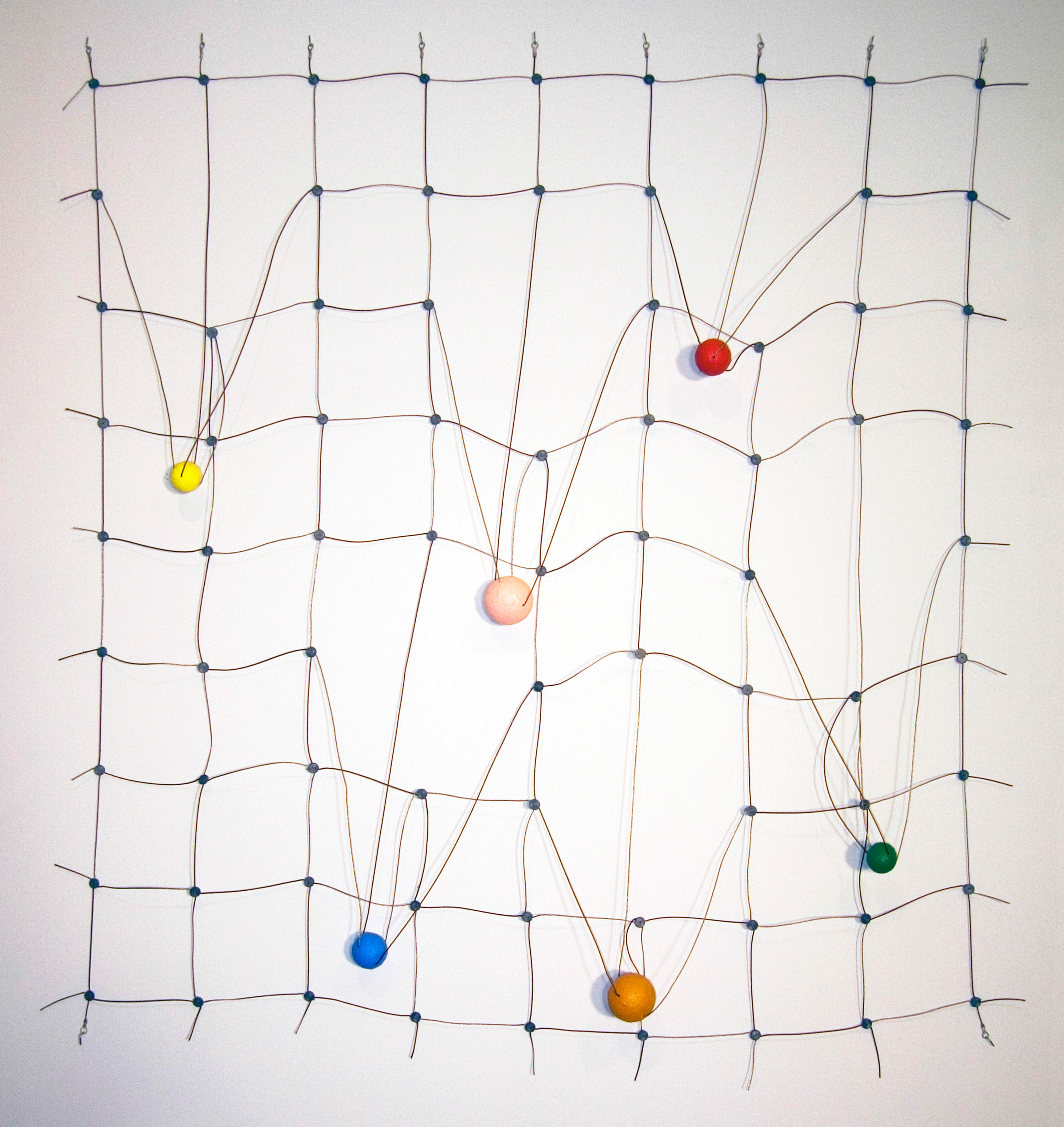 Catawampus, ©2005<br>Monel wire rope, Phosphor bronze wire rope, lead seals, ring terminals wood and acrylic paint. <br>
45h x 41.5w x 3d (inches) <br>
Estate of Charles Fahlen <br>
Exhibited: Steven Wolf Fine Arts, 2008